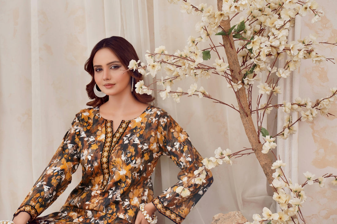 A woman in a floral print outfit with flowers